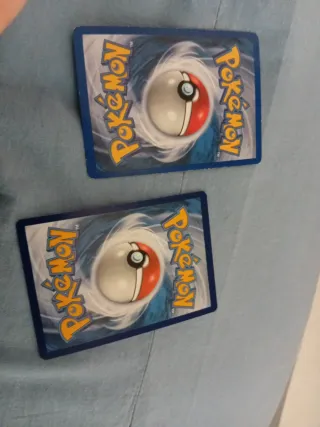 Carta Pokémon Ralts 211/190 y Dark Weezing