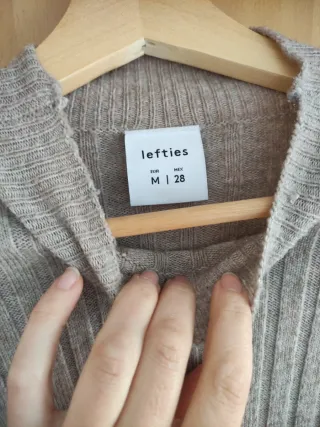 Jersey de rayas beige y negro