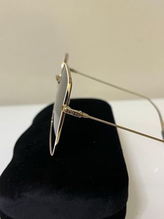 Occhiali Dior con custodia Gucci