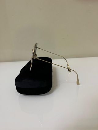 Occhiali Dior con custodia Gucci