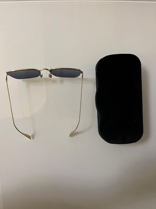 Occhiali Dior con custodia Gucci