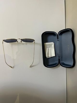 Occhiali Dior con custodia Gucci