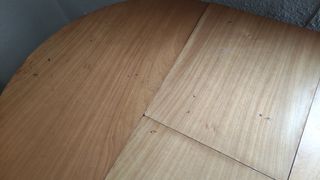 Mesa extensible redonda de madera