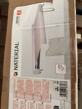 Toldo motorizado beige