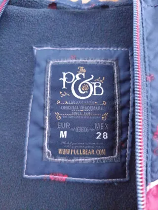 Cazadora bomber t. M granate y azul marino