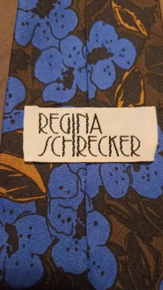 Cravatta gioiello con farfalla dorata