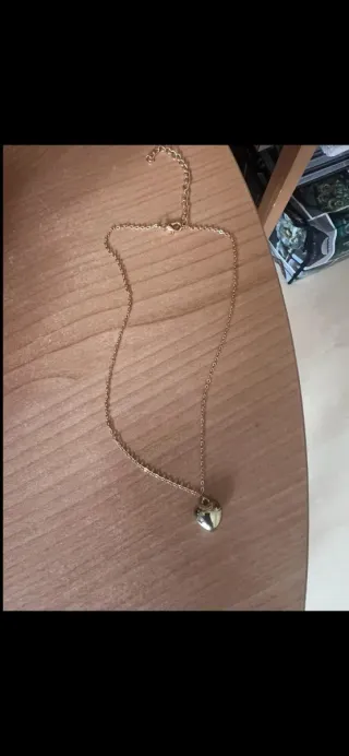 Collana con ciondolo a cuore dorato