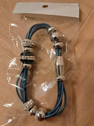Pulsera cuerdas finas. Nueva