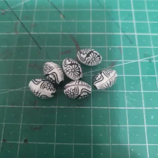 Cuentas ovaladas imitación cerámica