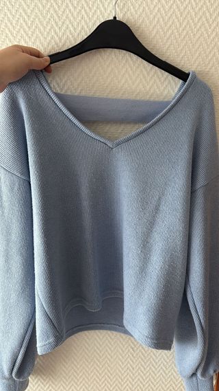 Jersey cuello pico azul claro talla S