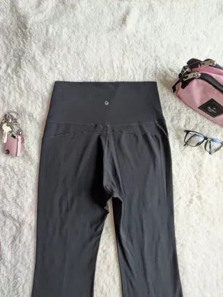 Leggings Glowmode negros flare tiro alto