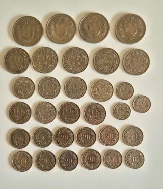 Lote de monedas francos suizos