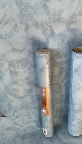 Carta da parati effetto pennellate blu