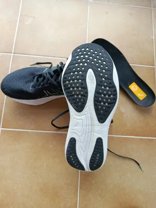 Zapatillas Asics PureGEL Nimbus  Negras y Azules .