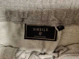 Nuevo Pantalón corto SikSilk gris hombre