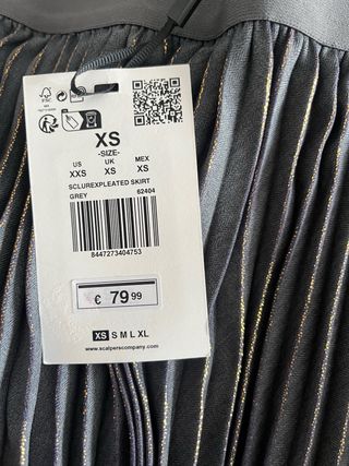 Falda plisada gris mujer