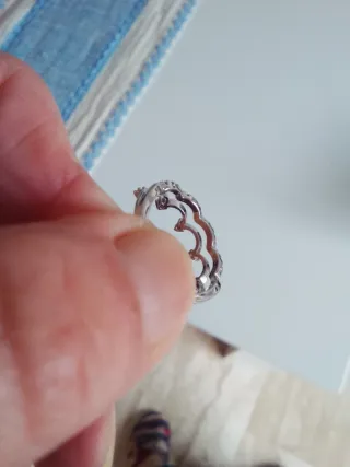 Anillo corona nueva mirar fotos