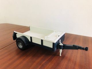 Bruder Land Rover con rimorchio