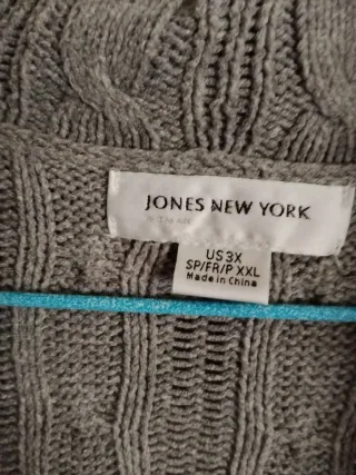 Chaqueta de punto gris trenzada