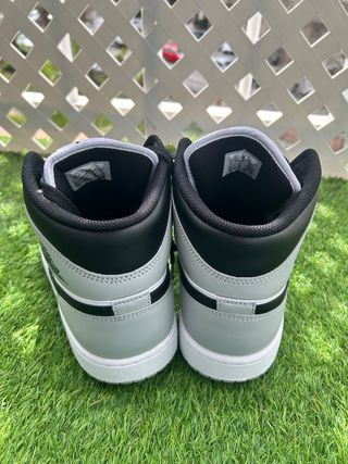 Jordan 1 Mid Hombre Negro Blanco