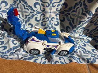 Coche Patrulla Transformable a Dinosaurio