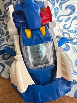 Coche Patrulla Transformable a Dinosaurio