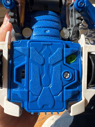 Coche Patrulla Transformable a Dinosaurio