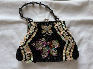 Portamonete farfalla e paillettes