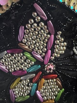 Portamonete farfalla e paillettes