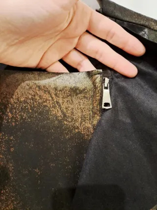 Giacca ecopelle nera e rame con rouches