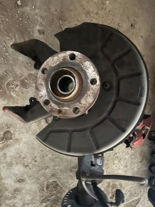 Muelles Golf 5 y manguetas delanteras