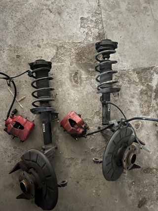 Muelles Golf 5 y manguetas delanteras