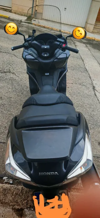 Honda SWT400. 2010 Negra No hay k hacerle nada.