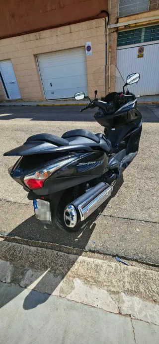 Honda SWT400. 2010 Negra No hay k hacerle nada.