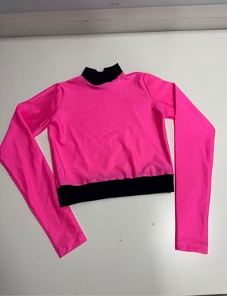Blusa deportiva Licra. niña rosa y negro.