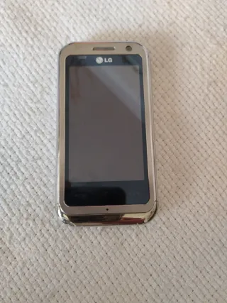 Teléfono LG Vintage Plata y Naranja