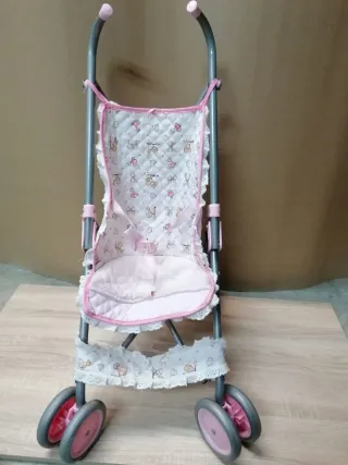 Cochecito de juguete para muñecas. Los 2