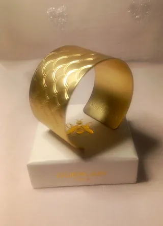 Bracciale Guerlain a fascia con rifinitura in oro