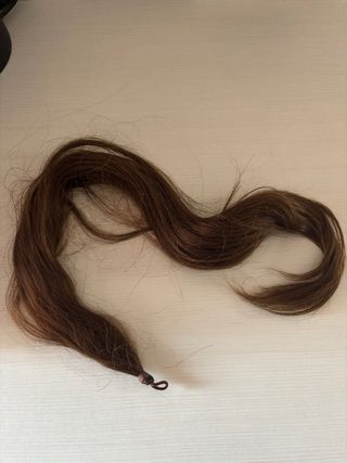 Moño y rodetes fallera cosidos castaño