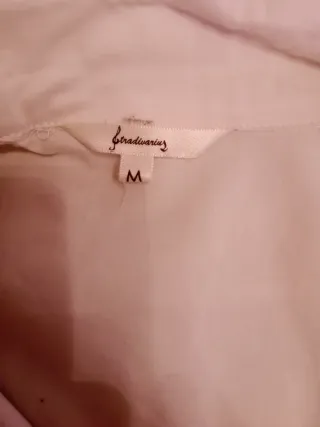 Blusa blanca manga corta con lazo