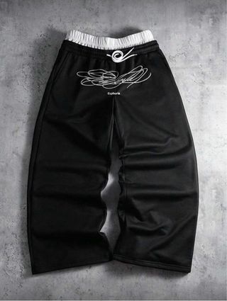 Pantaloni neri con stampa