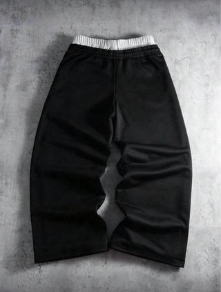 Pantaloni neri con stampa