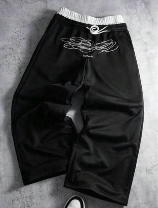 Pantaloni neri con stampa