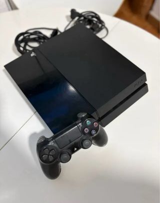 PS4 (PlayStation 4) con 2 mandos y juegos