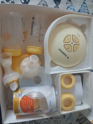 Sacaleches Medela Swing con accesorios
