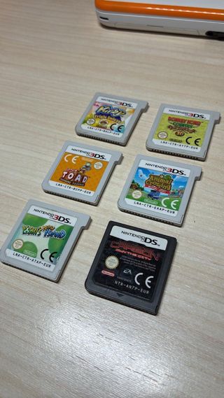 Nintendo 2DS XL Blanca y Naranja con Juegos