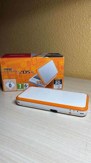 Nintendo 2DS XL Blanca y Naranja con Juegos