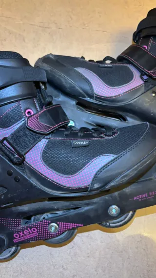 Patines en línea negros con detalles rosas