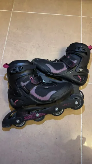 Patines en línea negros con detalles rosas
