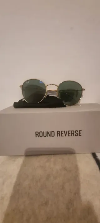Gafas de sol Ray-Ban doradas y verdes